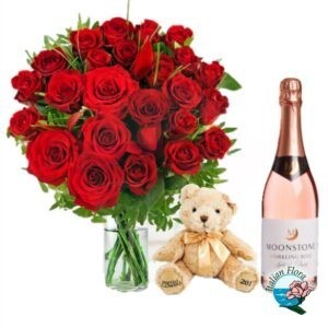 Bouquet di rose rosse con vino bianco e peluche